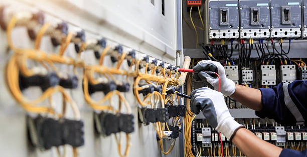 Professional Electrician technician working in Postville, IA